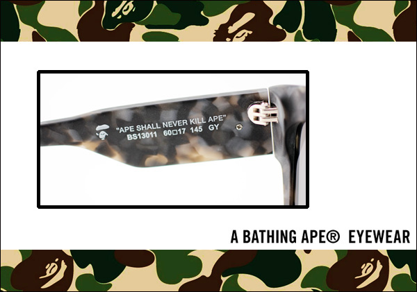 A Bathing Ape EYEWEAR 鏡腳內側有著顯著的雲石花紋，而上方印有 BAPE 的品牌標語 「APE SHALL NEVER KILL APE」