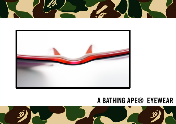 A Bathing Ape EYEWEAR 由上方觀看，黑色搭配螢光粉的撞色搭配，顯得亮眼
